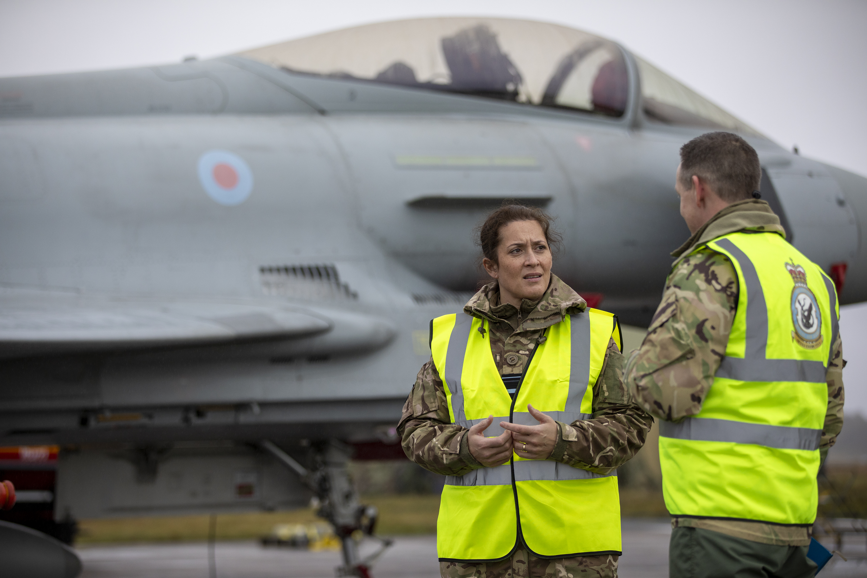 Air Vice Marshal Suraya Marshall talks with personnel, in-front of Typhoon.